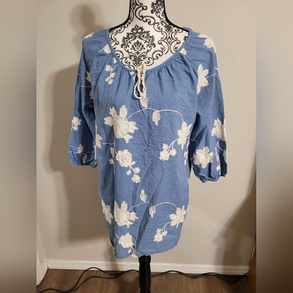 Woman's blue and white‎ floral embroidered top